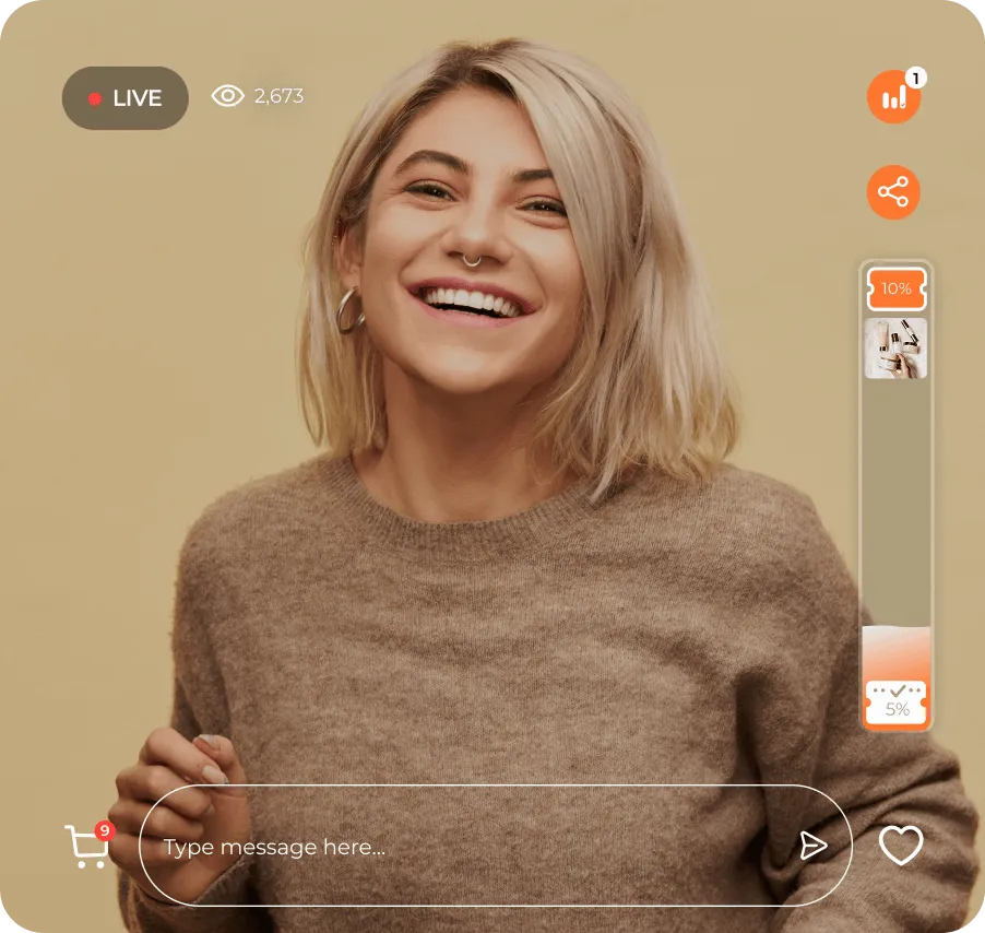 Smiling woman with blonde hair and septum piercing in a brown sweater during a live video stream interface with 2,673 viewers.